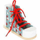 Lernspielzeug Fädelschuh